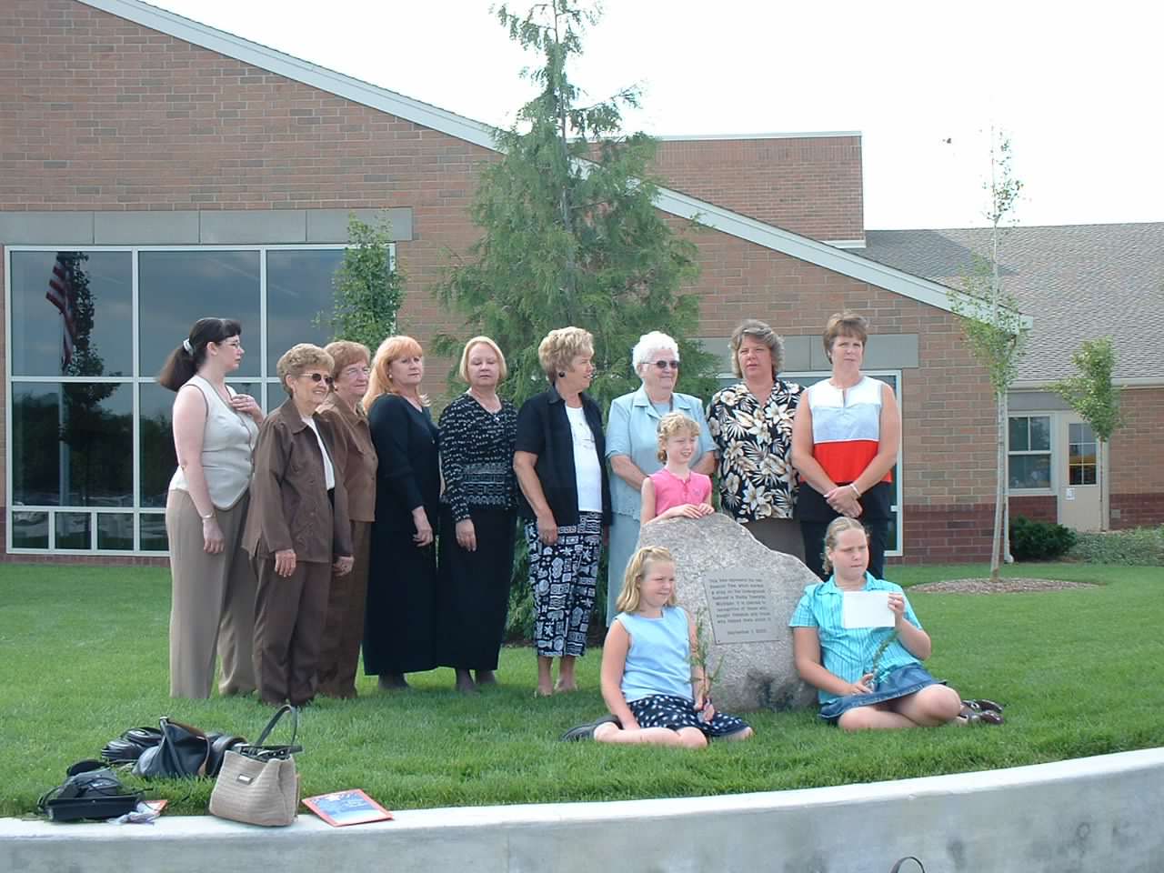 Lerich family members pose in front of Beacon Tree.